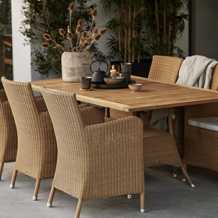 Boxhill's Hampsted Dining Chair and Lansing Dining Table make a cozy outdoor dining combination.