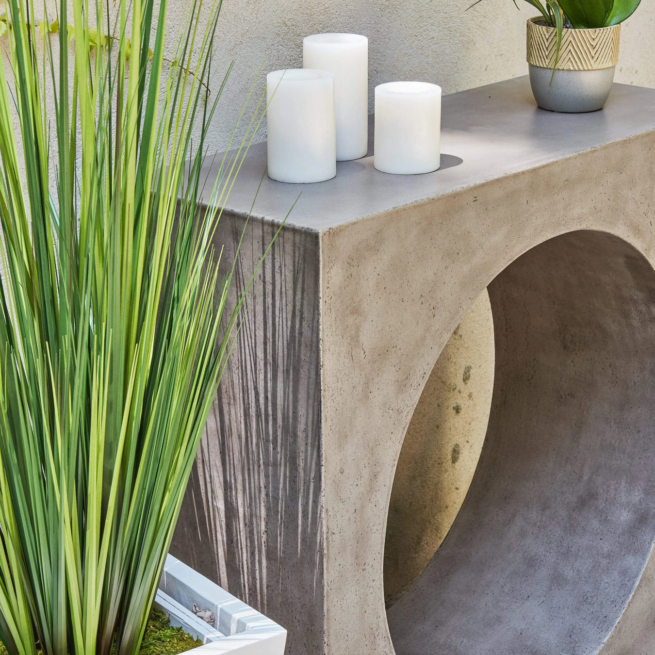 Concrete is grounding, strong and versatile in outdoor spaces