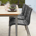 Boxhill's Core Patio Dining Chair (Set of 2) Grey lifestyle image with Core Garden Dining Table