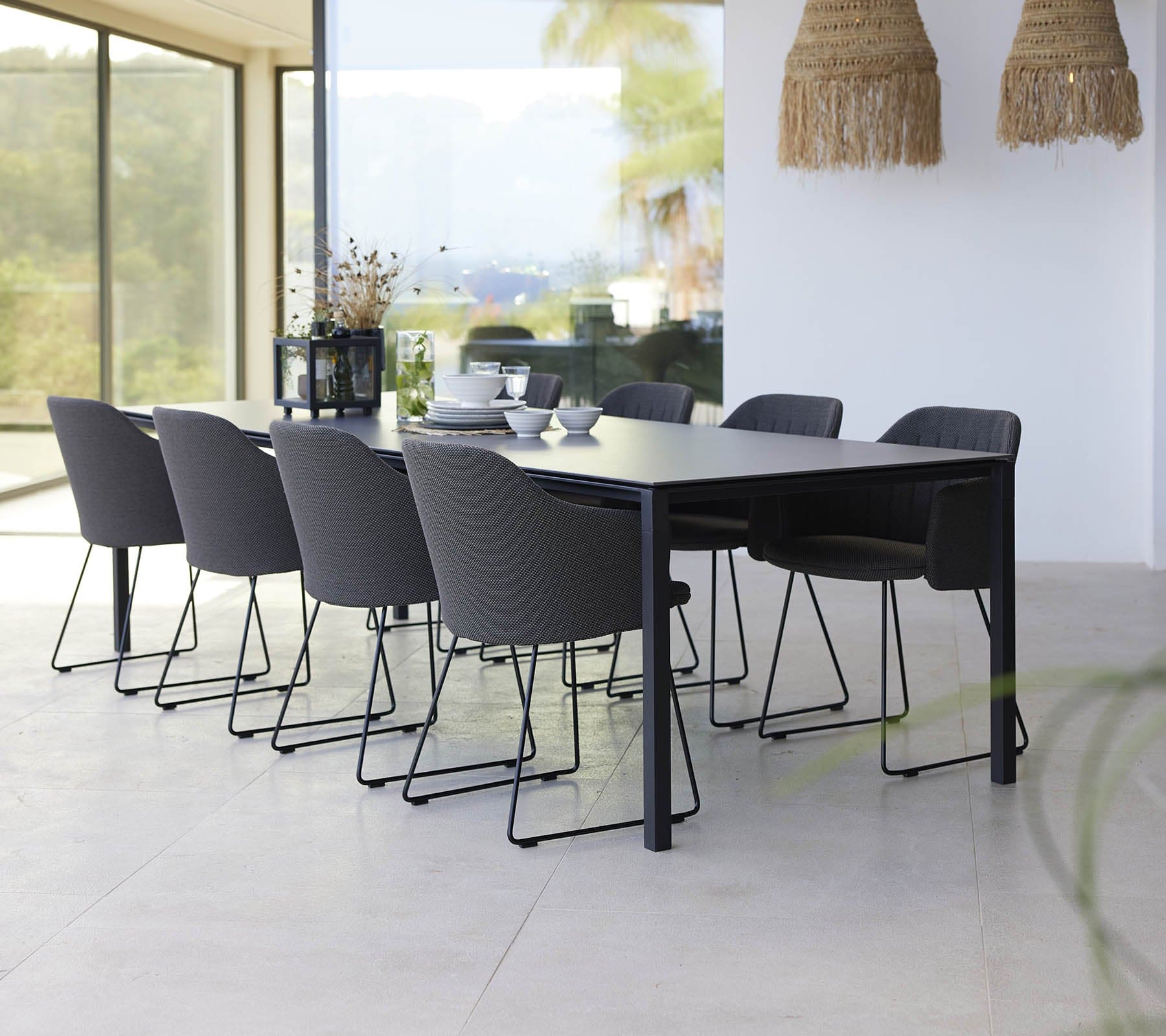 Boxhill's Choice Outdoor Dining Chair Warm Galvanized Steel Sledge Base lifestyle image with Pure Dining Table