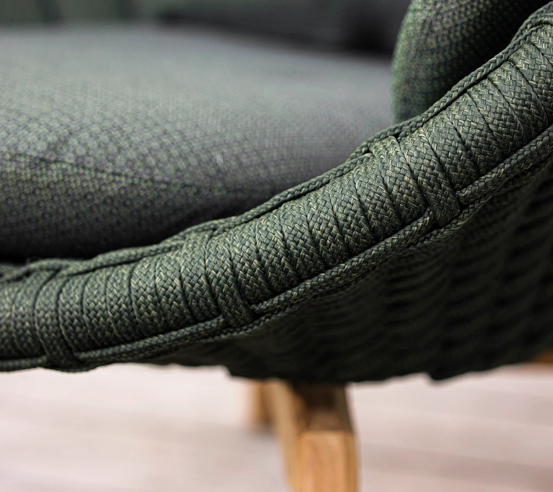 Boxhill's Peacock dark green outdoor lounge chair close up view