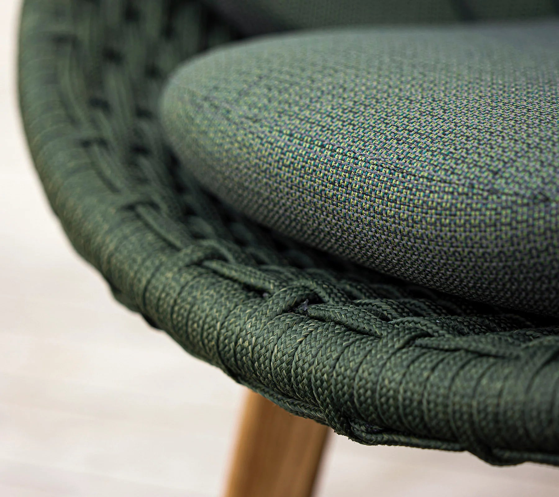 Boxhill's Peacock dark green outdoor lounge chair close up view