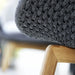 Boxhill's Peacock dark grey outdoor lounge chair with teak legs close up view