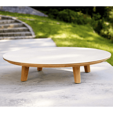 Boxhill's Aspect Round Coffee Table Travertine Look solo image at the garden
