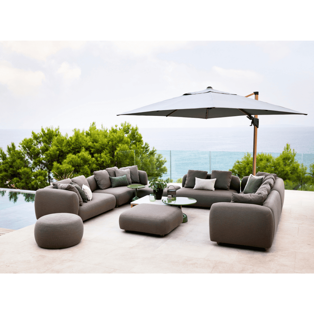 Boxhill's Capture Outdoor Corner Sofa | 2 Right Module lifestyle image  beside the pool with big umbrella shade