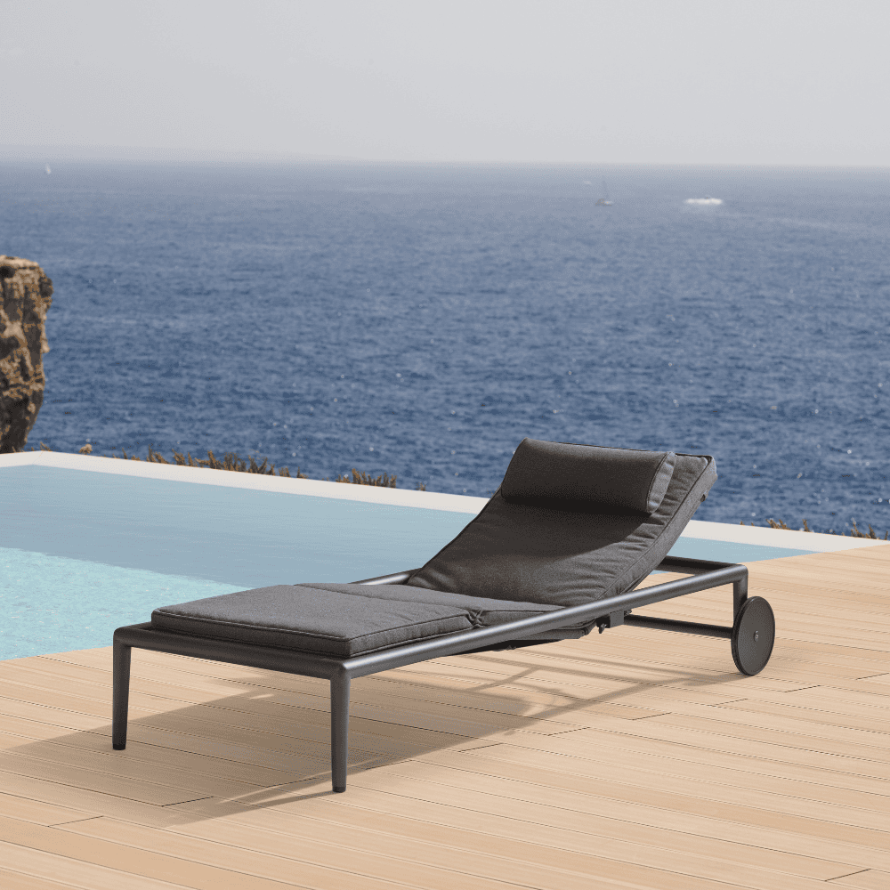Boxhill's Conic Rolling Chaise Lounge Sunbed Grey lifestyle image at wooden platform poolside