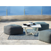 Boxhill's Divine Fabric Outdoor Footstool lifestyle image with small white square table and 3 cups and a pot on it