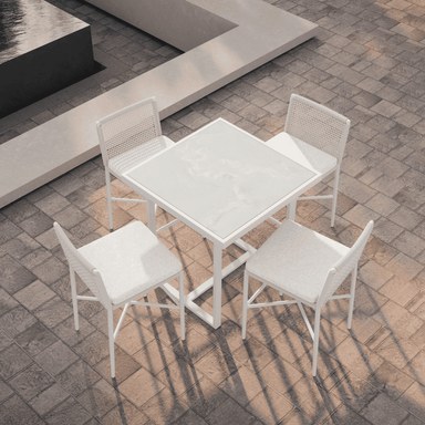 Boxhill's Outdoor Counter Table White Helena Dekton lifestyle image with Corsica Counter Stool