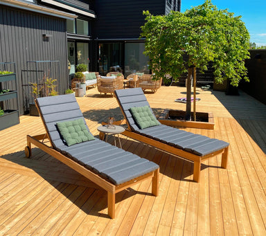 Boxhill's Amaze Sunbed Lounge Cushion lifestyle image at wooden platform garden