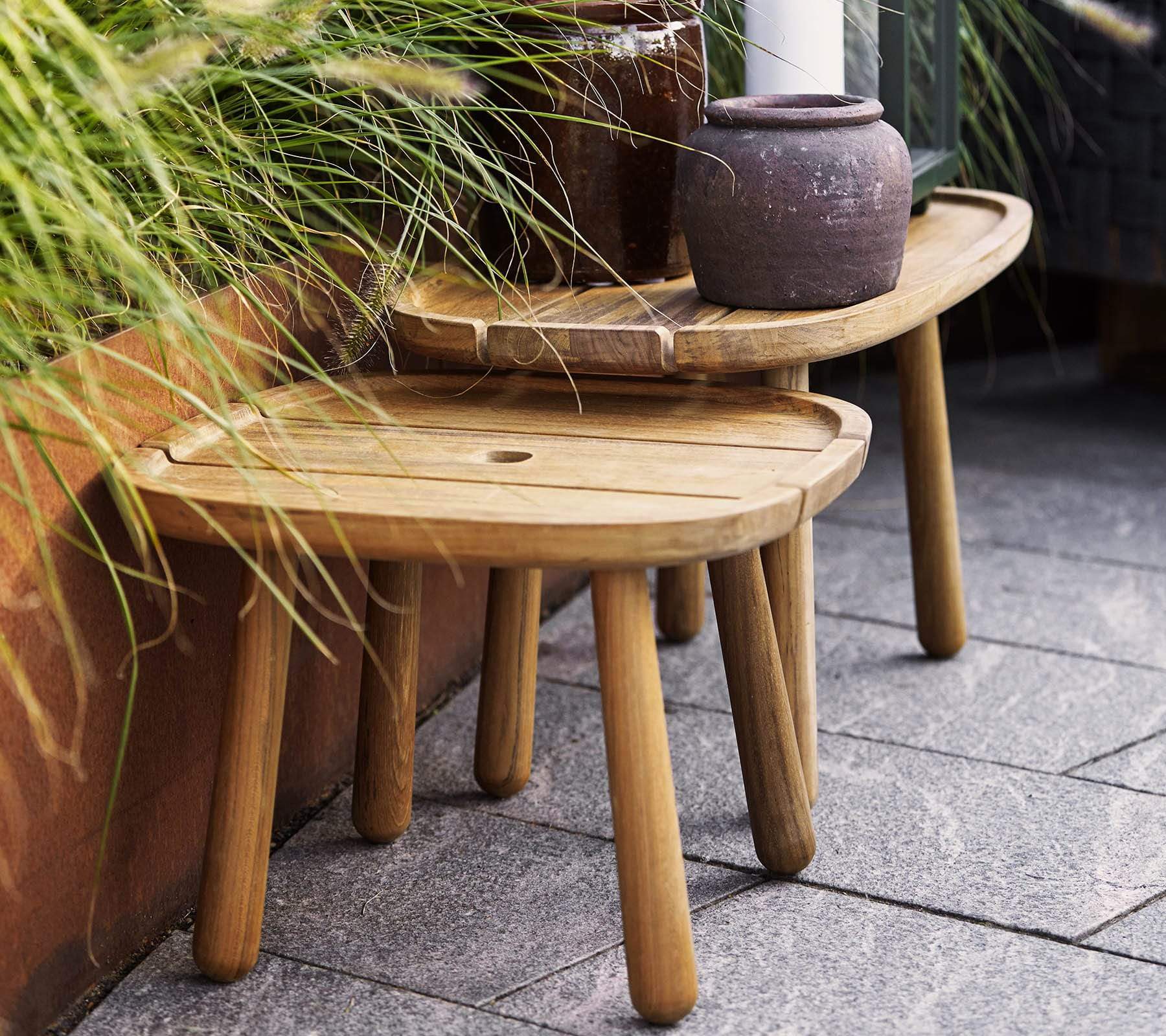  Boxhill's  Royal Coffee Table, Teak | Square and Rectangular with 2 pots on it placed beside plants