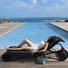 Boxhill's Escape Pool Side Sunbed lifestyle image with a woman lying down beside the pool