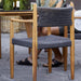 Boxhill's Royal Armchair, Teak Frame W. Dark Grey Boxhill Soft Rope with teak round table and a man sitting