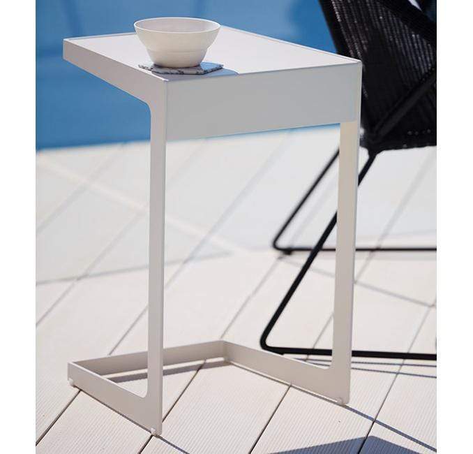 Boxhill's Time-Out white outdoor side table with white cups on it