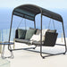 Boxhill's Cave Outdoor Swing Sofa lifestyle image with pillows on top