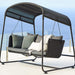 Boxhill's Cave Outdoor Swing Sofa lifestyle image with pillows on top