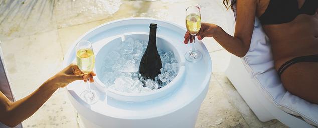 Boxhill's In-Pool side table duels also as a ice bucket cooler.