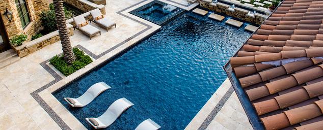 Boxhill modern pool design featuring in-pool furniture and outdoor furniture