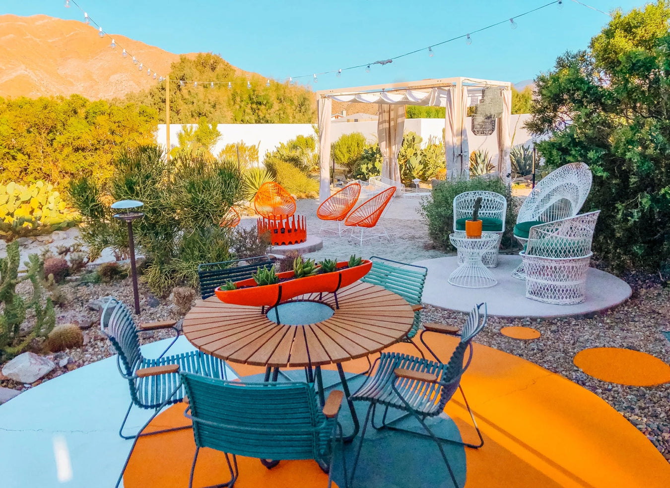 Palm Springs desert patio for Trixie Motel designer Dani Dazey featuring bright colors and midcentury modern styles.