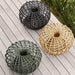 Boxhill's Nest Footstool/Coffee Table Outdoor lifestyle image on wooden platform, 3 different colors