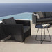 Boxhill's Diamond Weave Lounge Chair lifestyle image with Diamond 2-Seater Weave Sofa and side table beside the pool