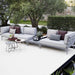 Boxhill's Conic Single Seater Sofa Module Light Grey lifestyle image with Conic Module Sofa and Conic Coffee Table at patio