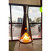 Black tall modern outdoor metal fire pit with flames placed against a paneled glass wall