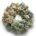 Pastel dried hydrangea wreath on a white background.