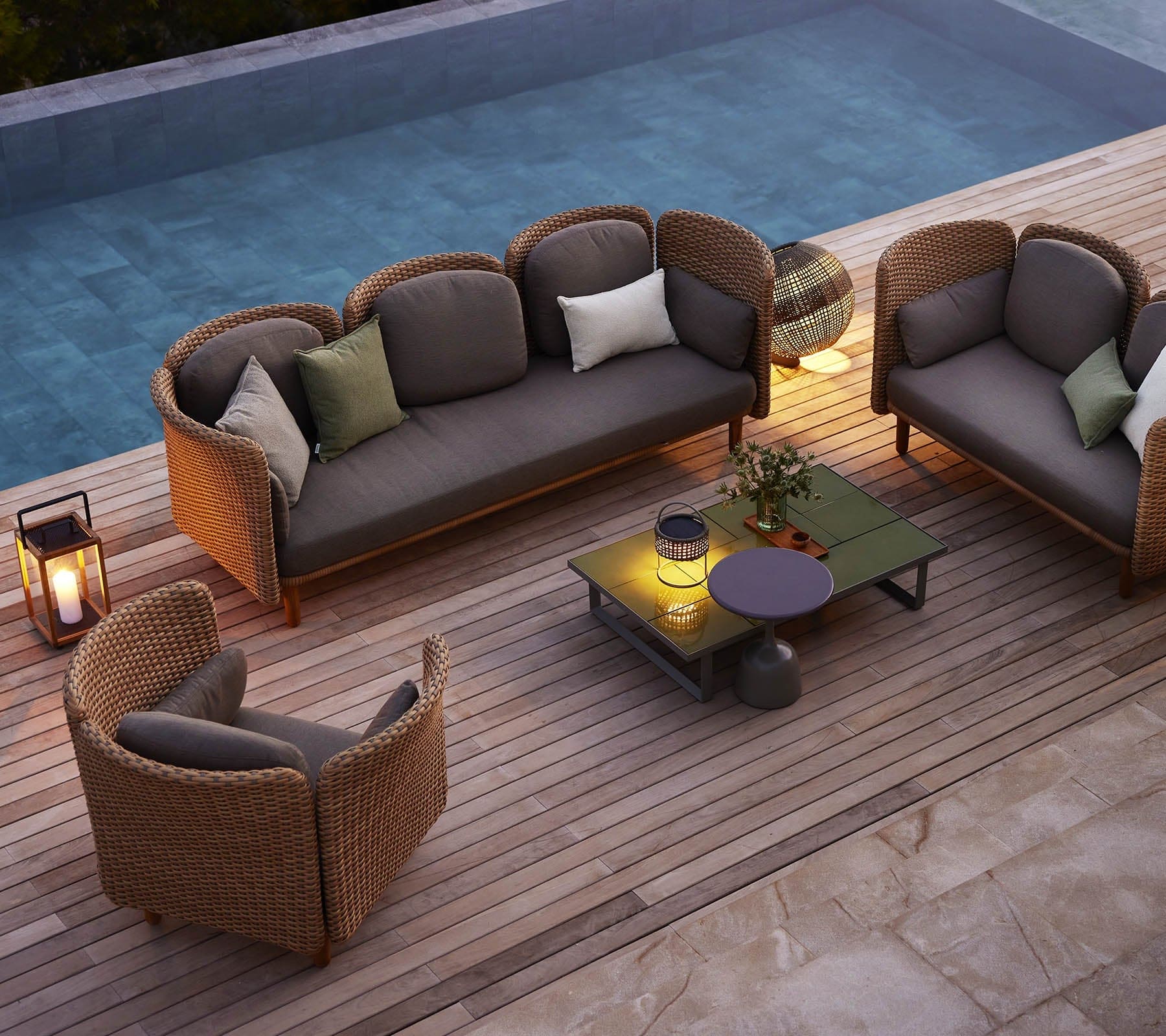 Boxhill's Arch Outdoor Lounge Chair | Low Arm/Back lifestyle image with Arch 2-Seater Sofa | Low Arm/Back and Arch 3-Seater Sofa | Low Arm/Back beside the pool