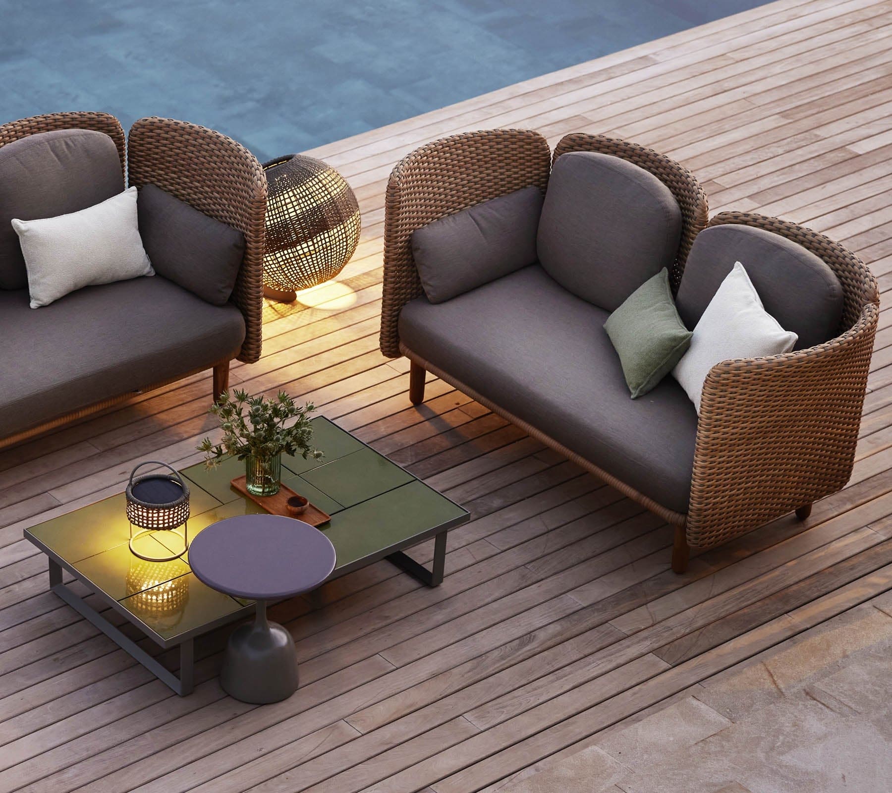 Boxhill's Arch 2-Seater Outdoor Sofa | Low Arm/Back lifestyle image beside the pool
