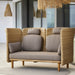 Boxhill's Arch Outdoor 2-Seater Module Sofa lifestyle image with High Arm/Back and cushion