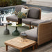 Boxhill's Arch Outdoor Coffee Table w/ Teak Table Top lifestyle image beside Arch Outdoor Sofa