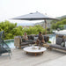 Boxhill's Arch Outdoor 2-Seater Module Sofa with Low Arm/Back, High Arm/Back and cushion lifestyle image beside the pool with man and woman sitting down