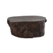 Bark Bronze Coffee Table with a smooth, organically shaped top and dark bronze bark-textured sides.