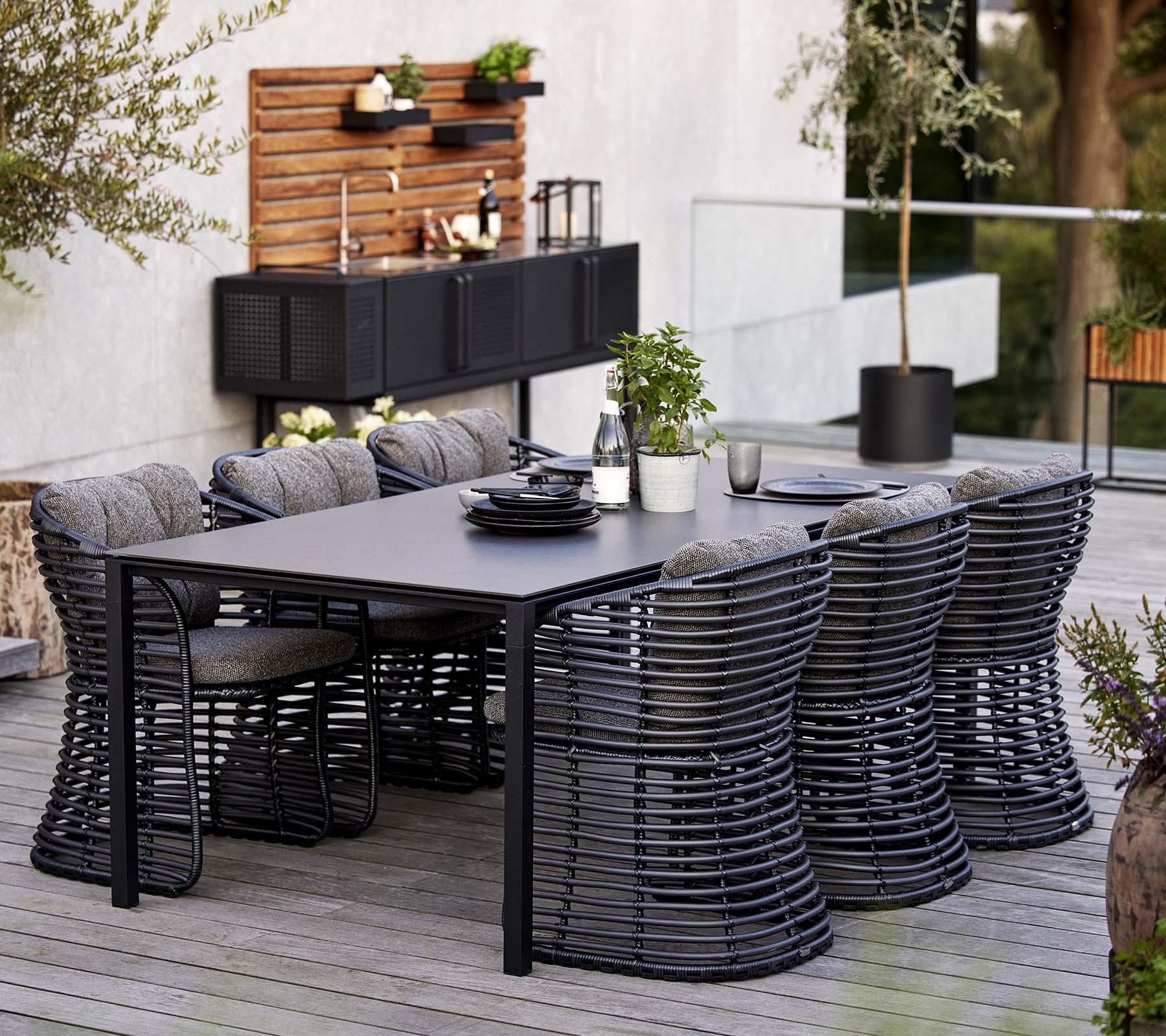 Boxhill's Basket Outdoor Dining Chair Graphite lifestyle image with Aspect dining table