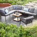Boxhill's Ocean Outdoor Single Module Sofa lifestyle image with other Ocean Module Sofa and Chair Collection and Level Coffee Table with Teak Top at patio