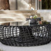 Boxhill's Nest Footstool/Coffee Table Outdoor Lava Grey, Large with Table Top Safety Glass lifestyle image at patio with Pot on top