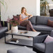 Boxhill's Diamond 3-Seater Weave Sofa lifestyle image with other Diamond Sofa collection and a woman sitting down
