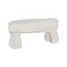 Angled view of the Cast Stone Outdoor Bench showing its thick sculpted seat and two chunky legs.
