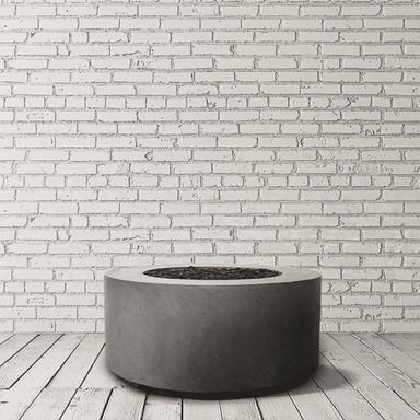 Cilindro Outdoor Round Concrete Round Fire Table in brick background