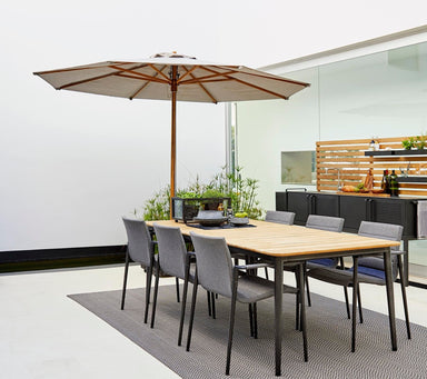 Boxhill's Classic Parasol with Pulley System lifestyle image with dining chairs and dining table at patio