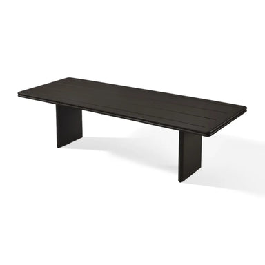 Black rectangular outdoor dining table with a flat top and bold vertical panel legs in a minimalist modern design.
