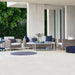 Boxhill's Connect 3-Seater Weave Sofa Natural lifestyle image with Connect Lounge Chair at patio