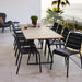 Boxhill's Copenhagen Dining Chair (Set of 2) Lava Grey lifestyle image with Copanhagen  Coastal Dining Table on balcony