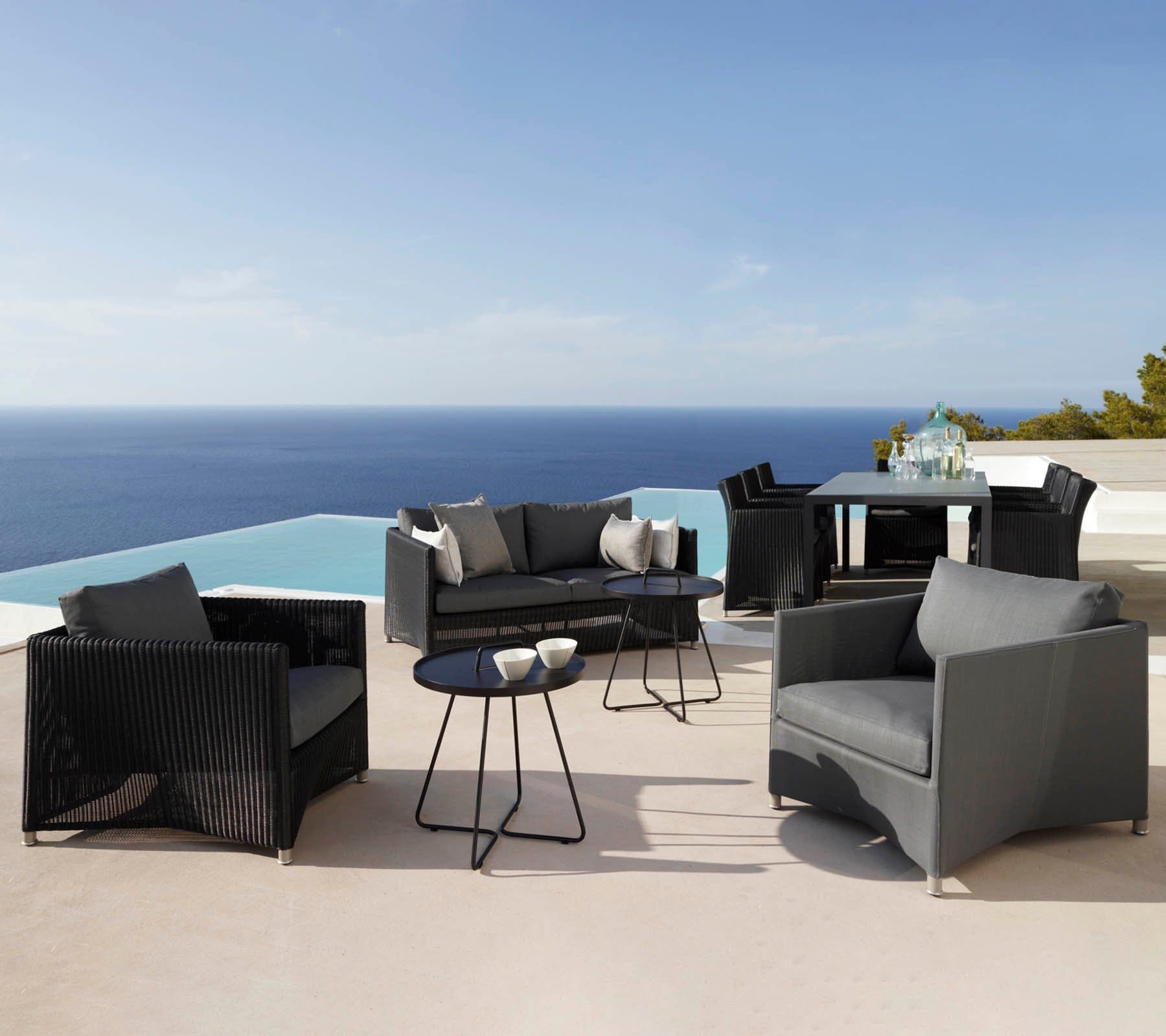 Boxhill's Diamond Weave Lounge Chair lifestyle image together with other Diamond Sofa collection beside the pool