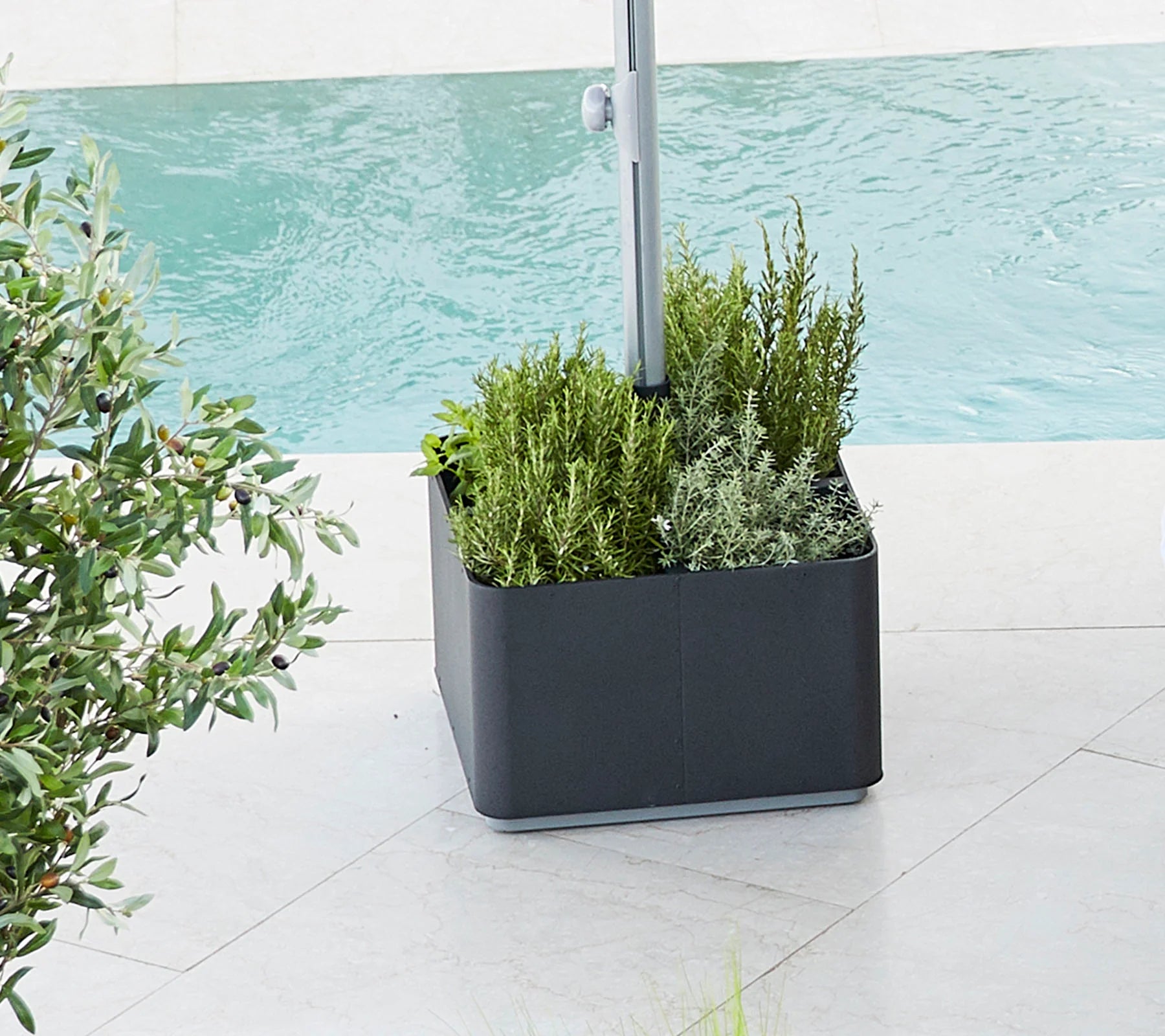 Boxhill's Grow Umbrella Base and Planter Box with Wheels lifestyle image at poolside
