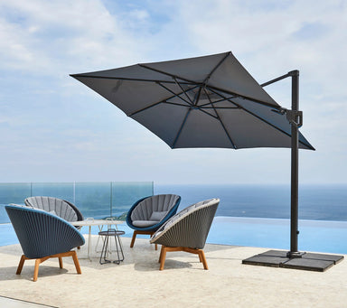 Boxhill's Hyde Luxe Tilt Aluminum Parasol | 3x3 m lifestyle image with 4 lounge chairs at poolside