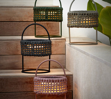 Boxhill's Illusion Outdoor Lamp | With Handlle lifestyle image on the stairs with 4 different colors 