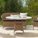 Boxhill's Lansing Outdoor 2-Seater Sofa Natural lifestyle image with Lansing Outdoor Lounge Chair and Lansing Outdoor Round Dining Table at patio