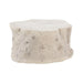 A rustic tree stump outdoor coffee table with a textured, bark-like finish in a light gray and beige stone-like finish, isolated on a white background.