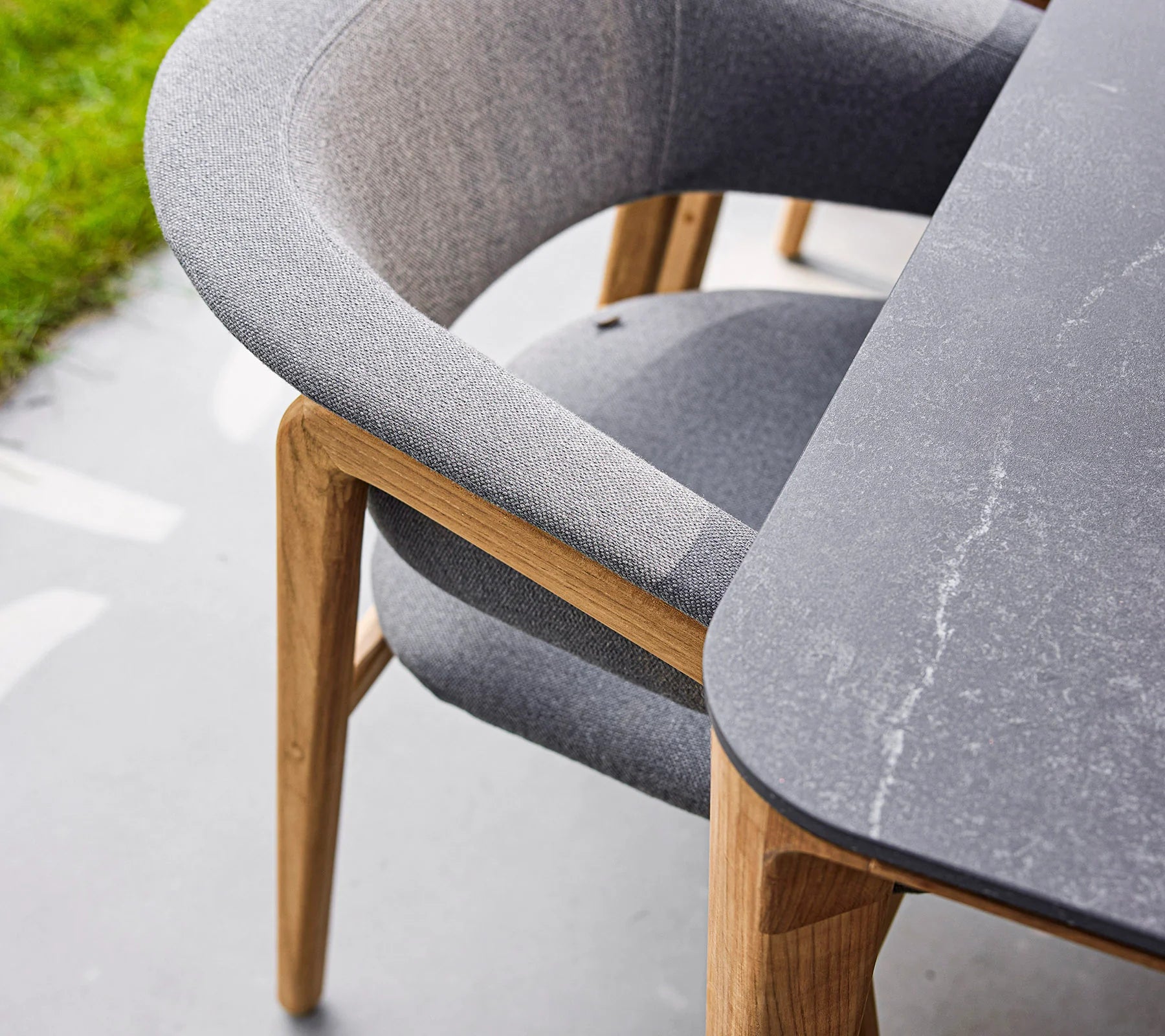Boxhill's Luna Outdoor Dining Armchair lifestyle image close up view